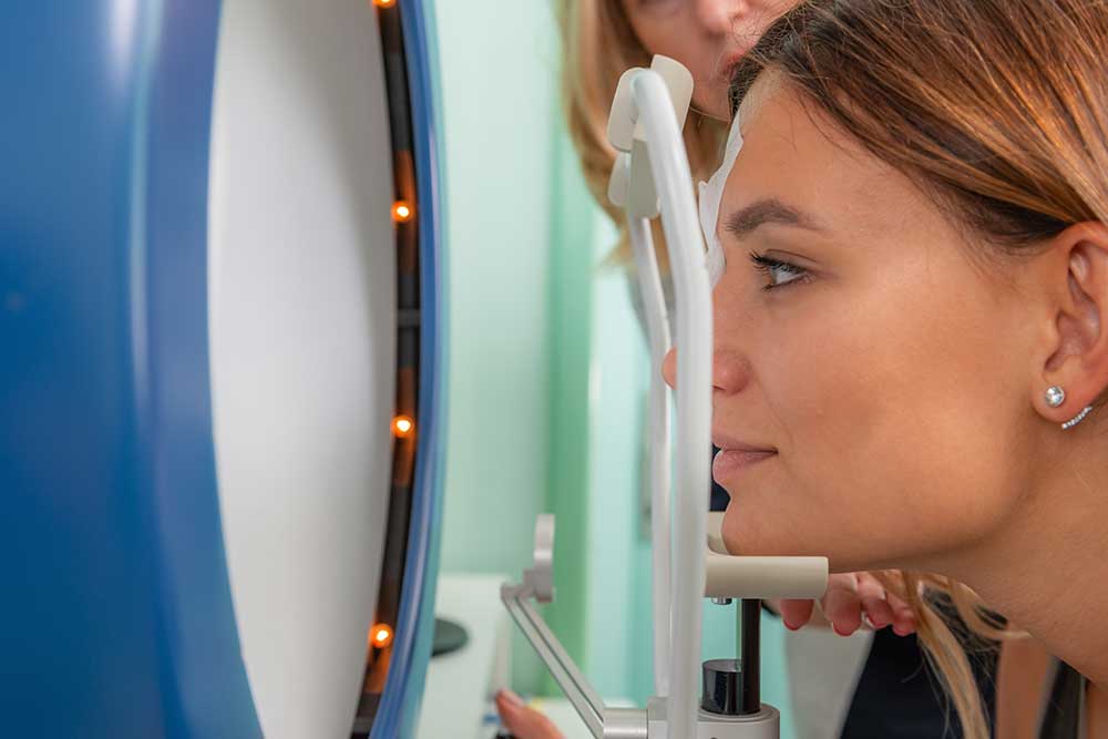 Patient receiving a comprehensive eye exam