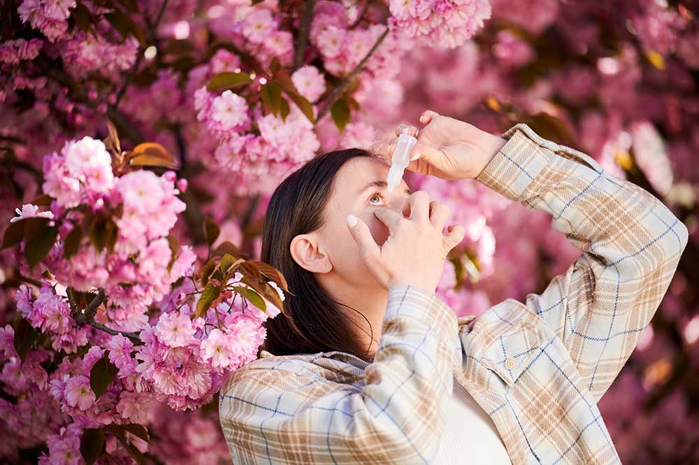 Optometrist examining a patient for eye infection